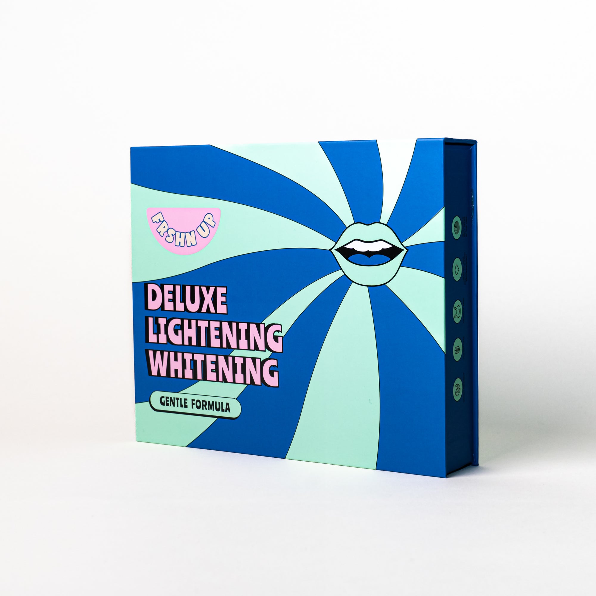A box with the words deluxe whitening whitening.