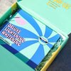 A Deluxe Lightening Whitening Kit - Gentle Formula presented inside an open box with a colorful design by FRSHN UP.