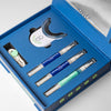 A blue box containing a toothbrush and toothpaste, perfect for the FRSHN UP Family Brightening Bundle.
