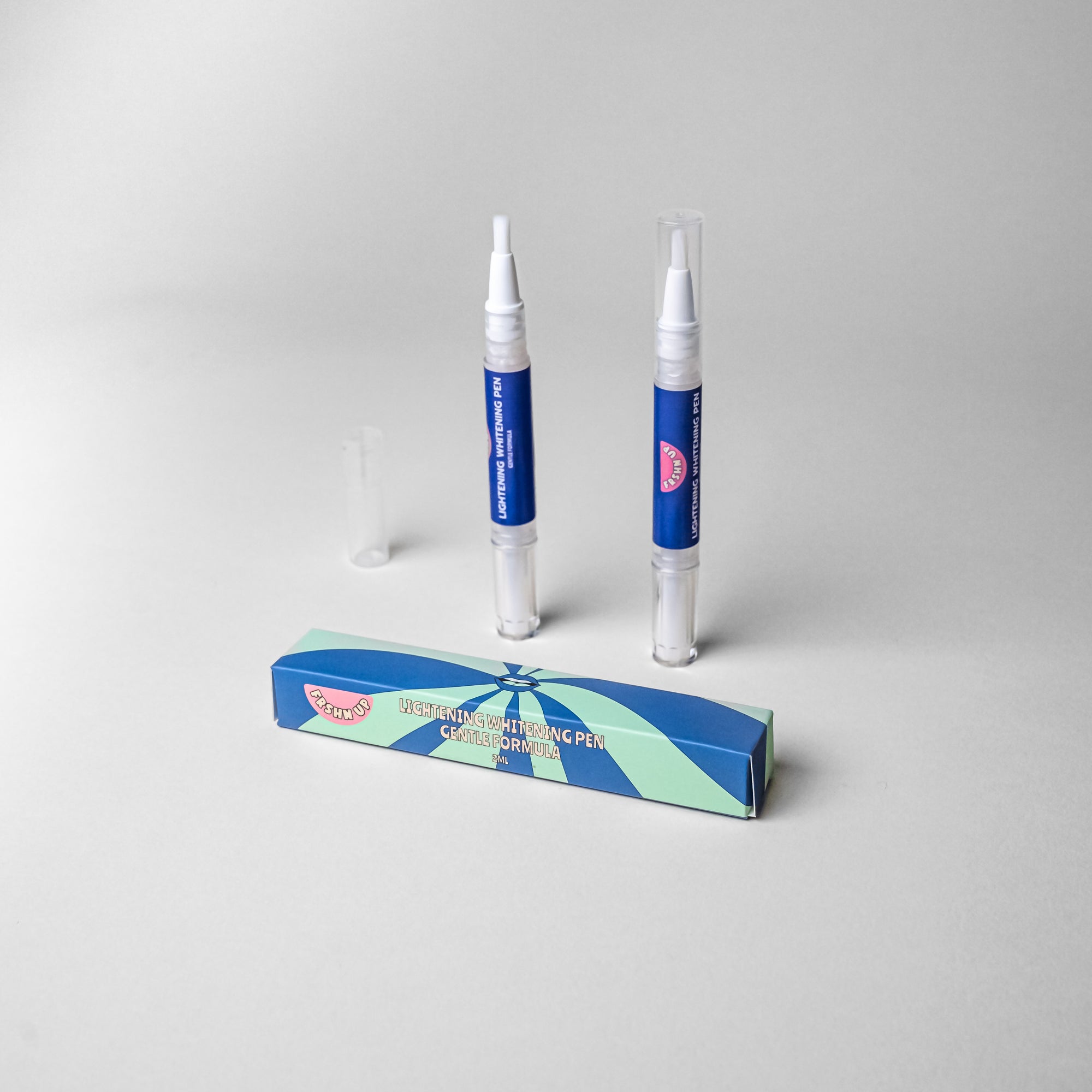 Two Lightening Whitening Pens - Gentle Formula - 2-pack by FRSHN UP in a box on a white surface.