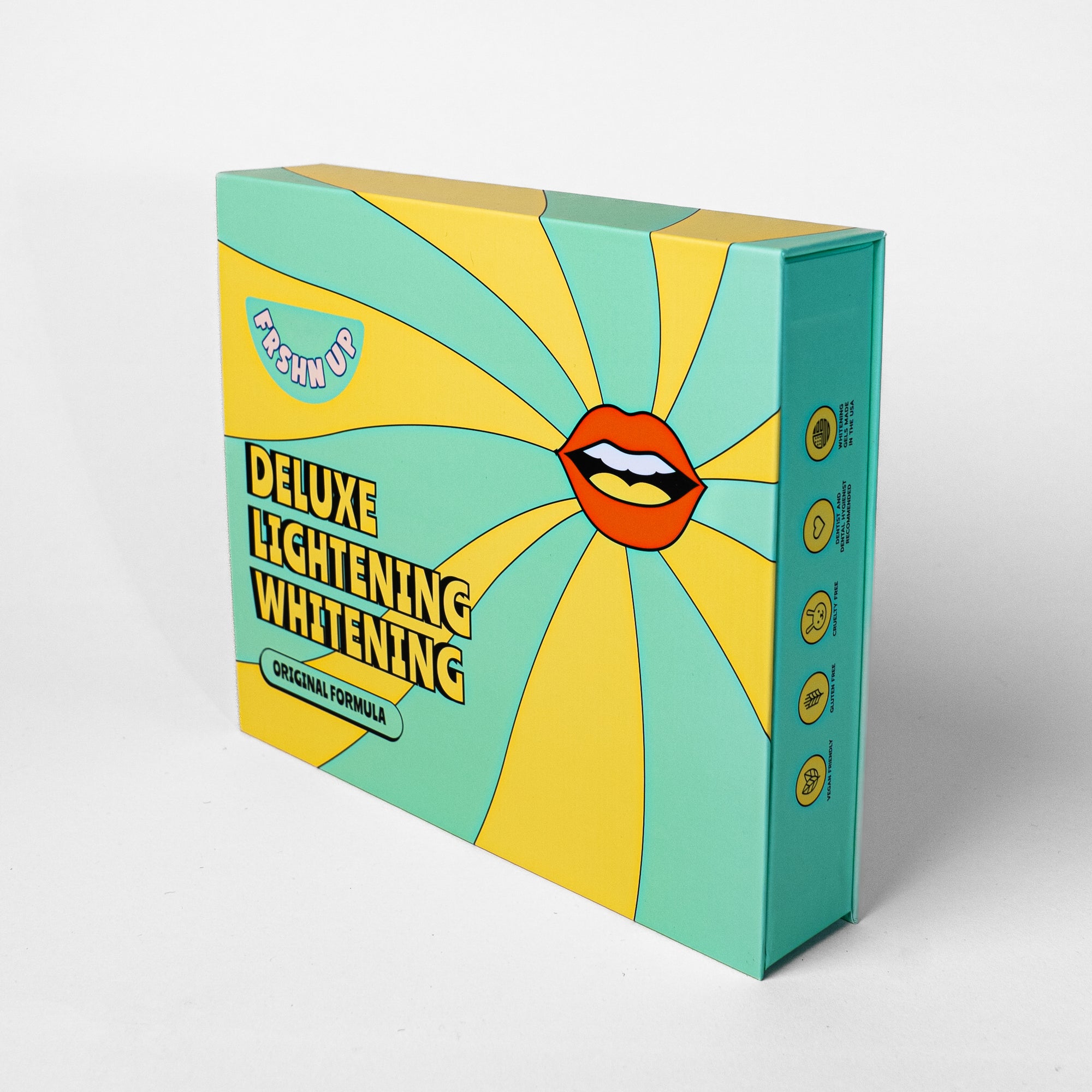 A FRSHN UP Deluxe Lightening Whitening Kit - Original Formula with a smiley face on it used for teeth whitening dentists.