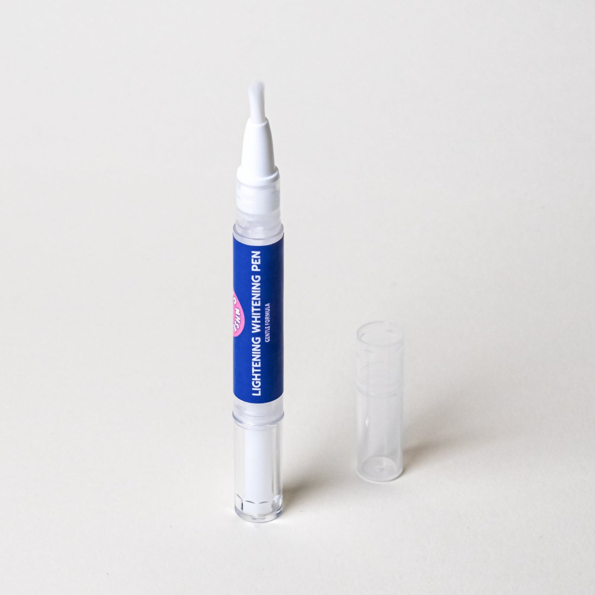 A FRSHN UP Lightening Whitening Pen - Gentle Formula gel applicator pen for sensitive teeth.